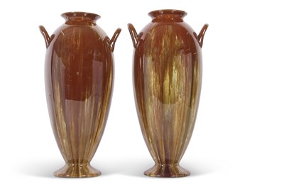 Lot 46 - A tall pair of Linthorpe pottery vases the...