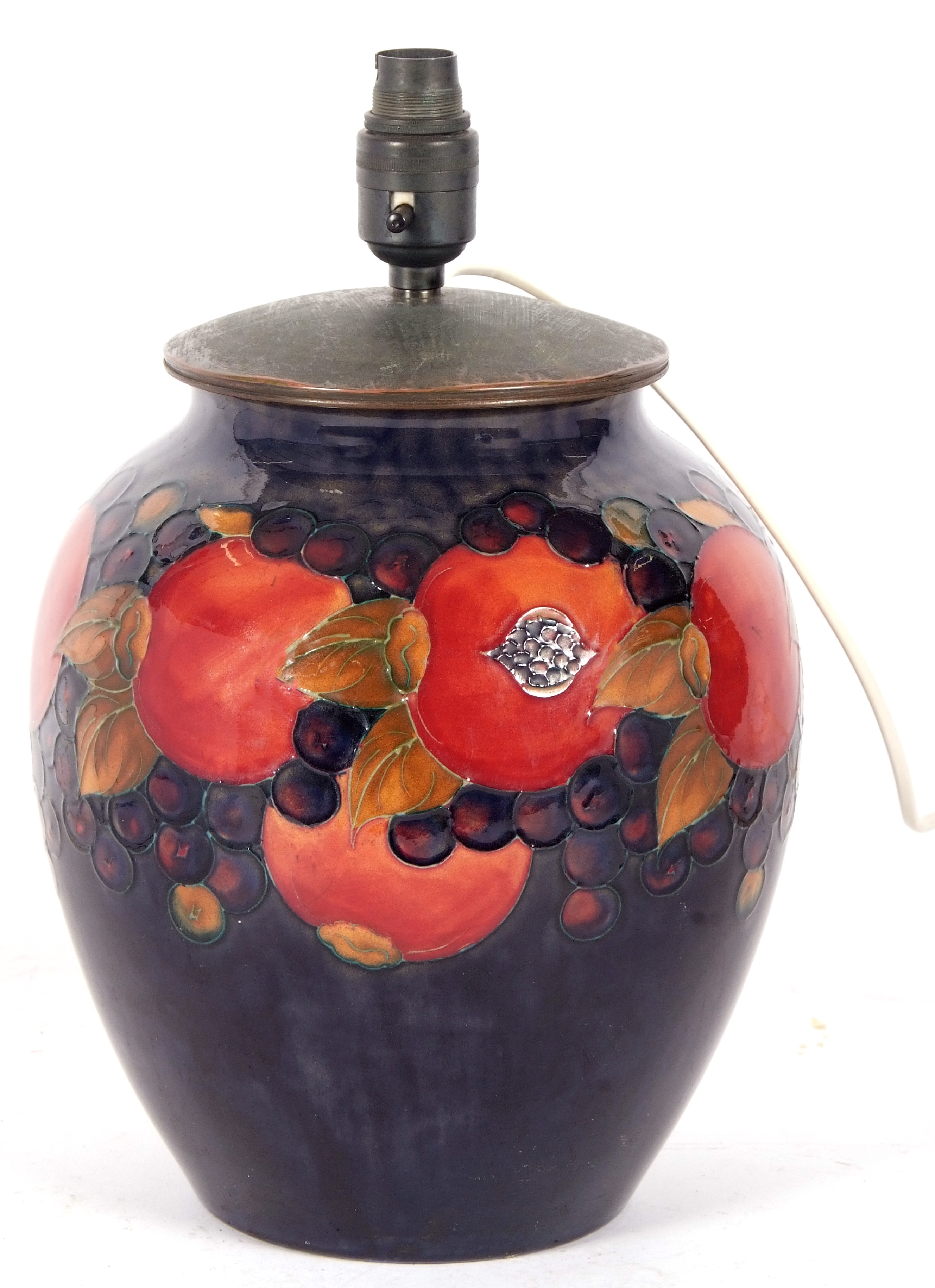 Lot 47 - A large Moorcroft pomegranate lamp base, the