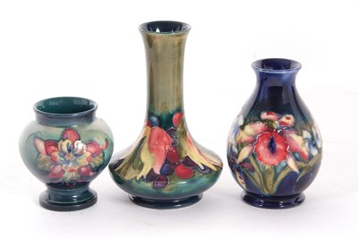 Lot 49 - A group of three small Moorcroft vases, one...