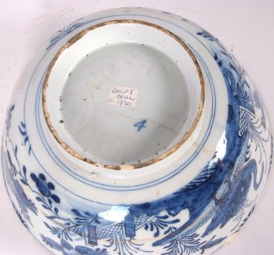 Lot 51 - An early 18th Century English Delft punch bowl,...