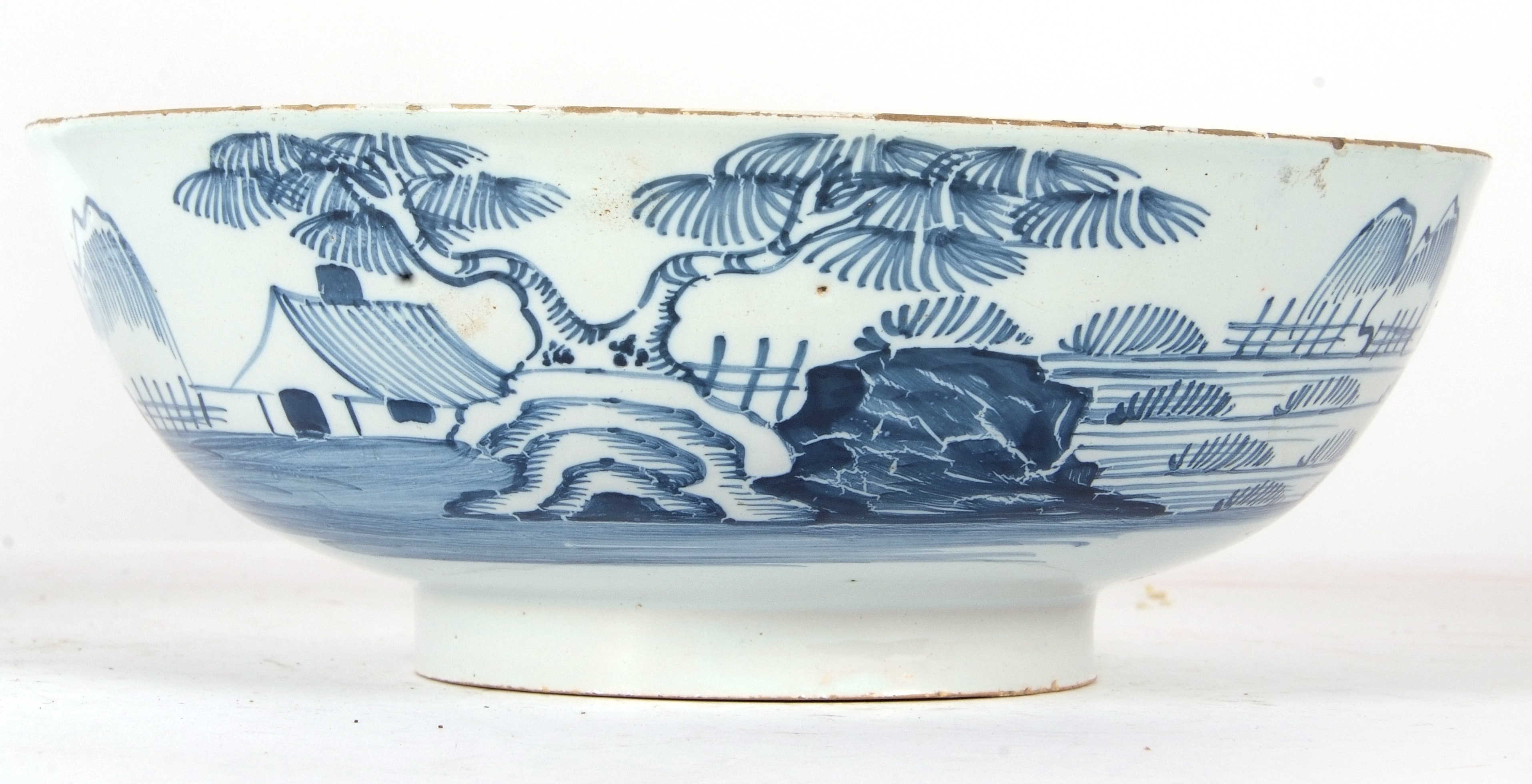 Lot 52 - An English Delft punch bowl circa 1760 with