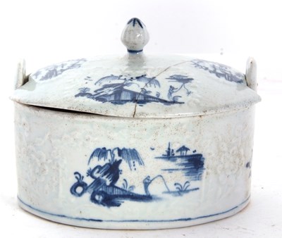 Lot 63 - A Lowestoft porcelain butter tub and cover,...