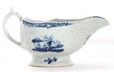 Lot 67 - A small Lowestoft sauce boat with reserves of...
