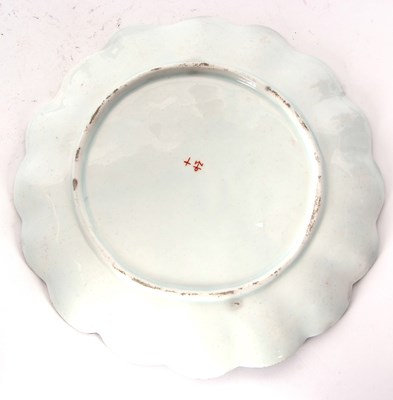 Lot 80 - A Bow porcelain plate with polychrome...