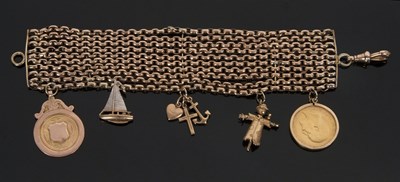 Lot 336 - A charm bracelet, the ten strand bracelet...