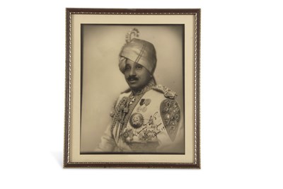 Lot 130 - A framed signed photograph of Umaid Singh...