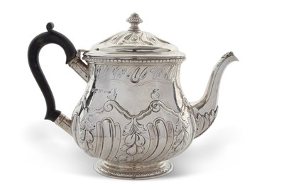 Lot 235a - Edwardian silver teapot of slight baluster...
