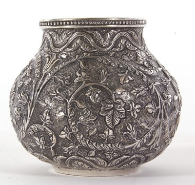 Lot 82 - Indian Kutch white metal baluster vase having...