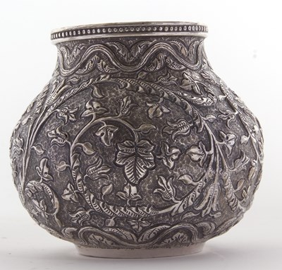 Lot 82 - Indian Kutch white metal baluster vase having...