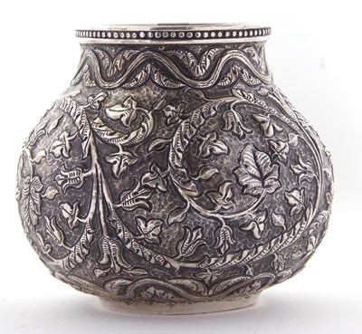 Lot 82 - Indian Kutch white metal baluster vase having...