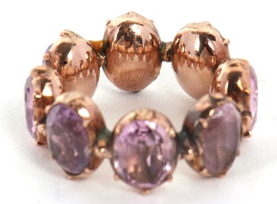 Lot 331 - A 19th century foil backed amethyst eternity...