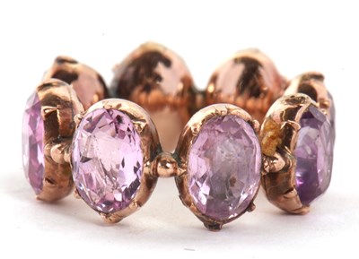 Lot 331 - A 19th century foil backed amethyst eternity...