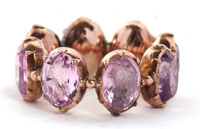 Lot 331 - A 19th century foil backed amethyst eternity...