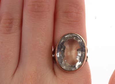 Lot 28 - A citrine ring, the oval mixed cut citrine in...