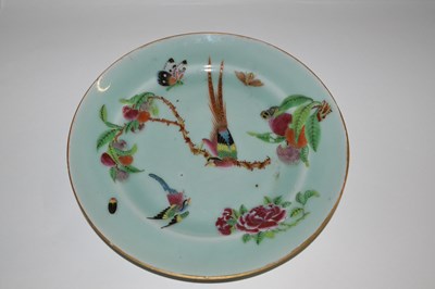 Lot 303 - A Cantonese plate, the celadon ground painted...
