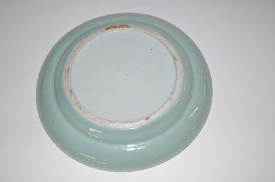 Lot 303 - A Cantonese plate, the celadon ground painted...
