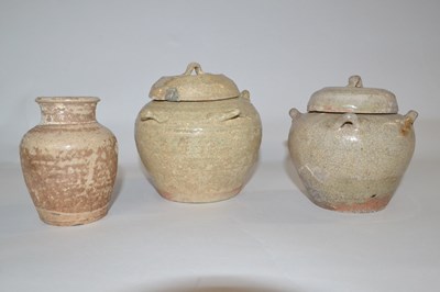 Lot 307 - Group of two Chinese pottery jars with lids...