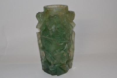 Lot 325 - A Chinese carved quartz vase decorated in...