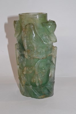 Lot 325 - A Chinese carved quartz vase decorated in...