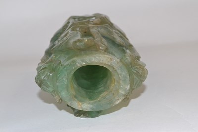 Lot 325 - A Chinese carved quartz vase decorated in...