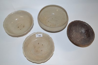 Lot 309 - Group of four Chinese pottery bowls, possibly...