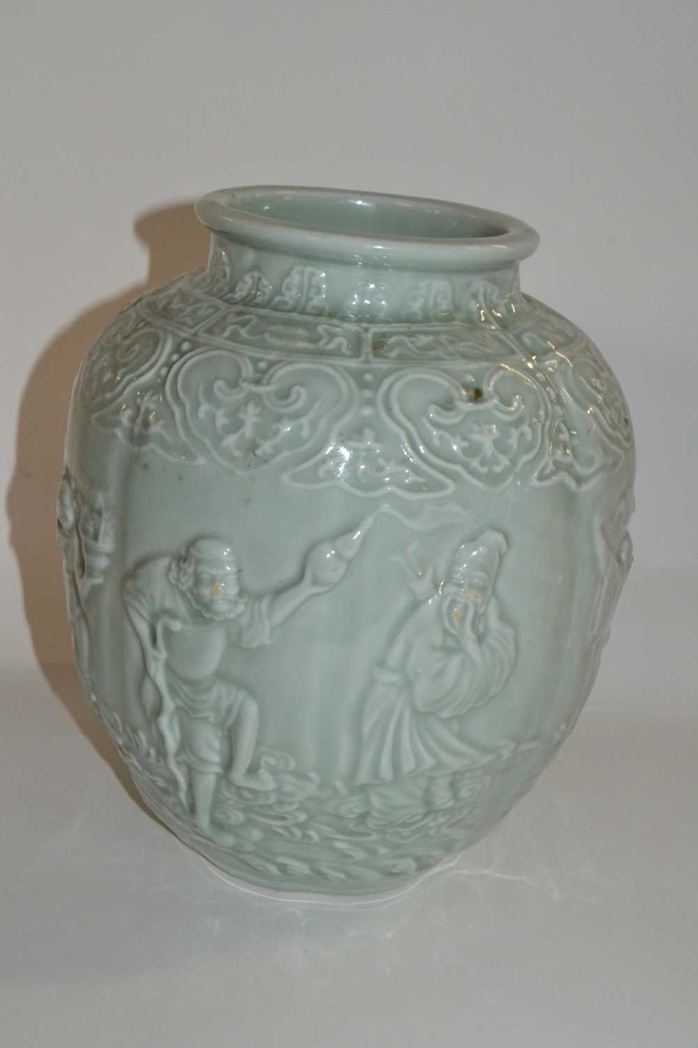 Lot 318 - A Chinese vase of globular form, the celadon...