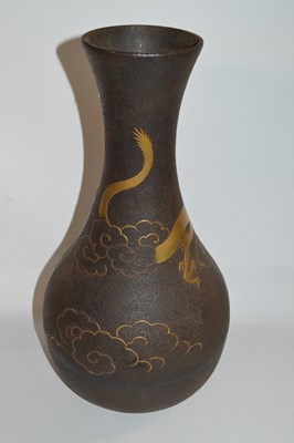 Lot 319 - A Japanese iron vase of baluster form...