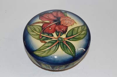 Lot 333 - A Moorcroft box and cover in the Simeon design,...