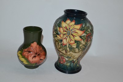 Lot 366 - A small Moorcroft vase decorated with Hibiscus...