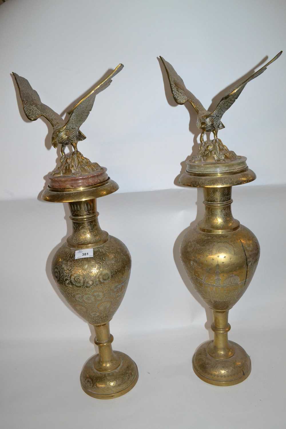 Lot 381 - A large pair of brass vases with Islamic style...