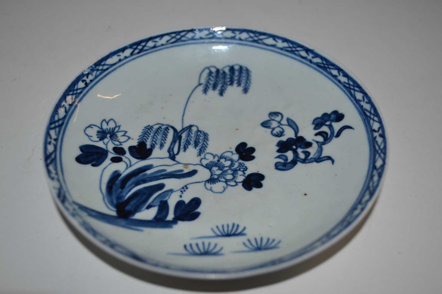 Lot 391 - A Liverpool Chaffers saucer with blue and...