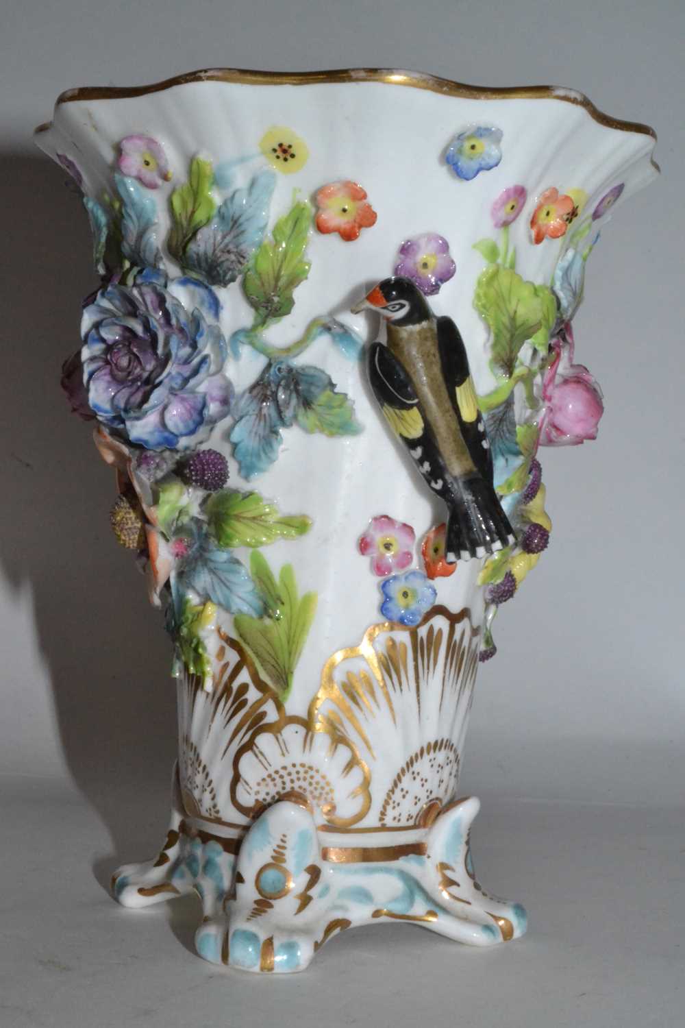 Lot 392 - A 19th Century English porcelain spill vase,...