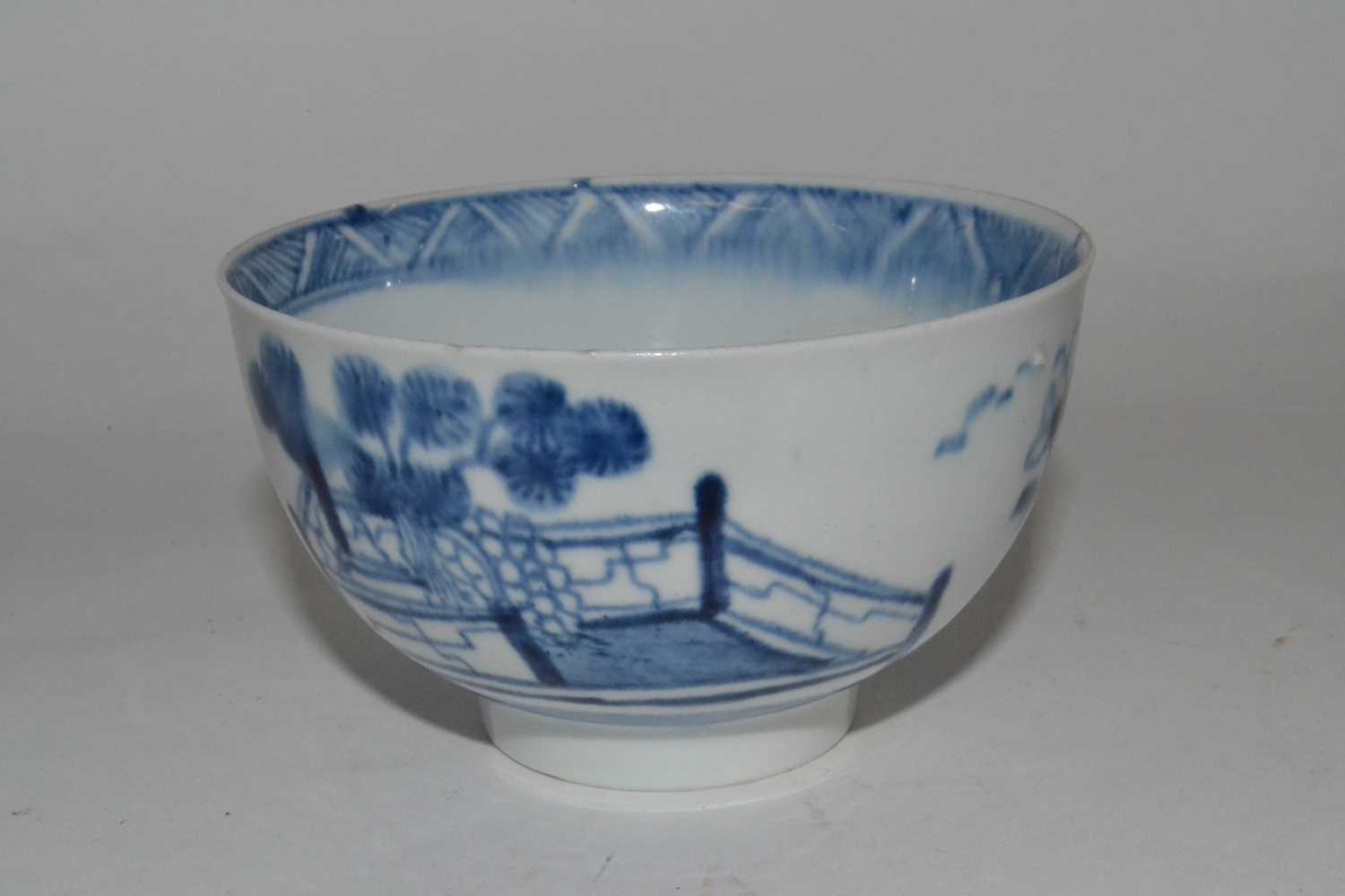 Lot 393 - An English porcelain tea bowl, 18th Century...