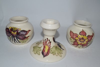 Lot 395 - A pair of Moorcroft small vases, decorated...