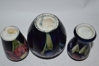 Lot 396 - Group of three small Moorcroft vases, the blue...