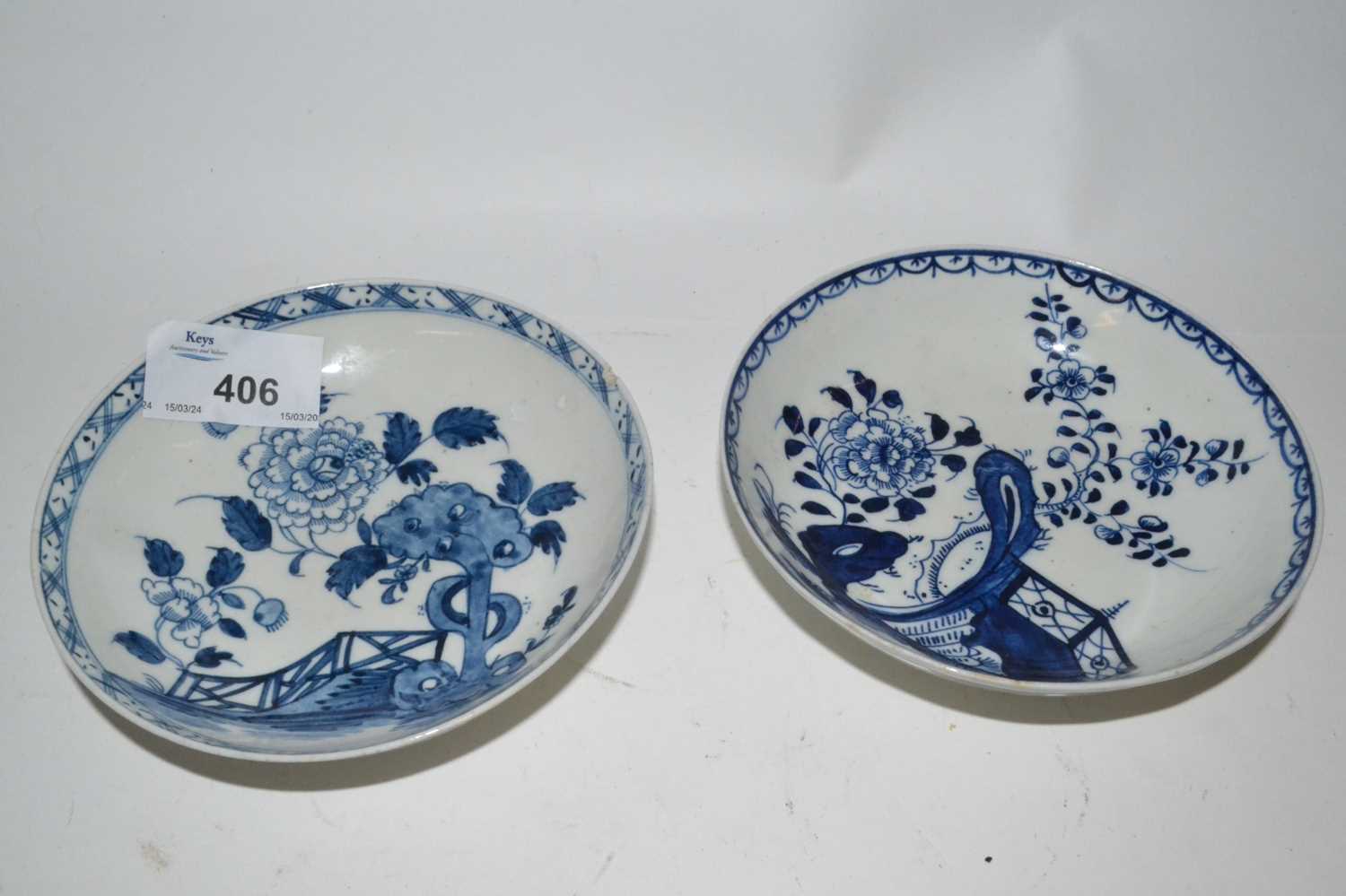 Lot 406 - Two Lowestoft porcelain saucers both with blue...