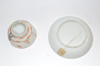 Lot 410 - A Lowestoft porcelain tea bowl and saucer with...