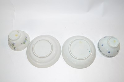 Lot 411 - Two Lowestoft porcelain tea bowls and saucers,...
