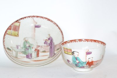 Lot 412 - A Lowestoft porcelain tea bowl and saucer with...