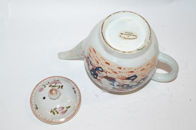 Lot 414 - A Lowestoft porcelain teapot decorated in...