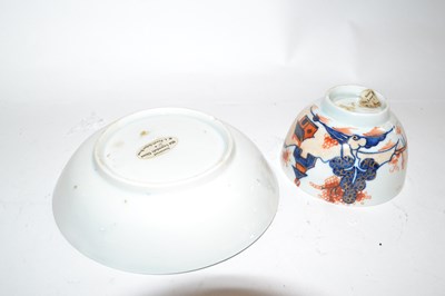 Lot 415 - A Lowestoft porcelain tea bowl and saucer in...