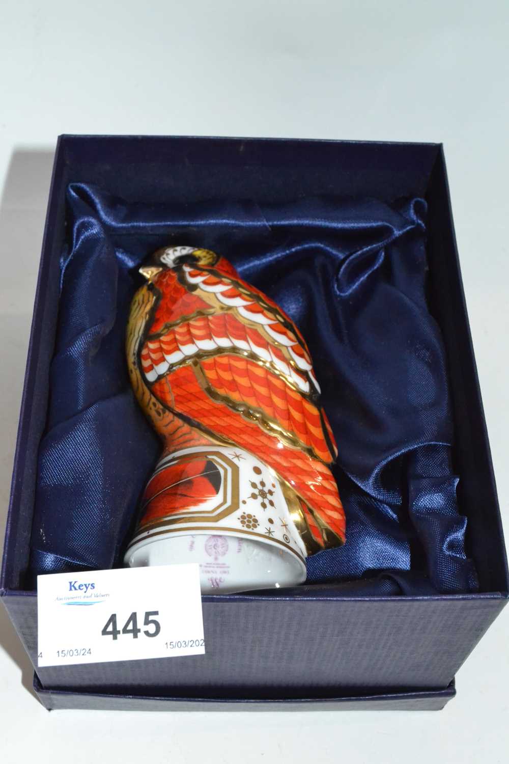 Lot 445 - A boxed Royal Worcester candlesnuffer in the...