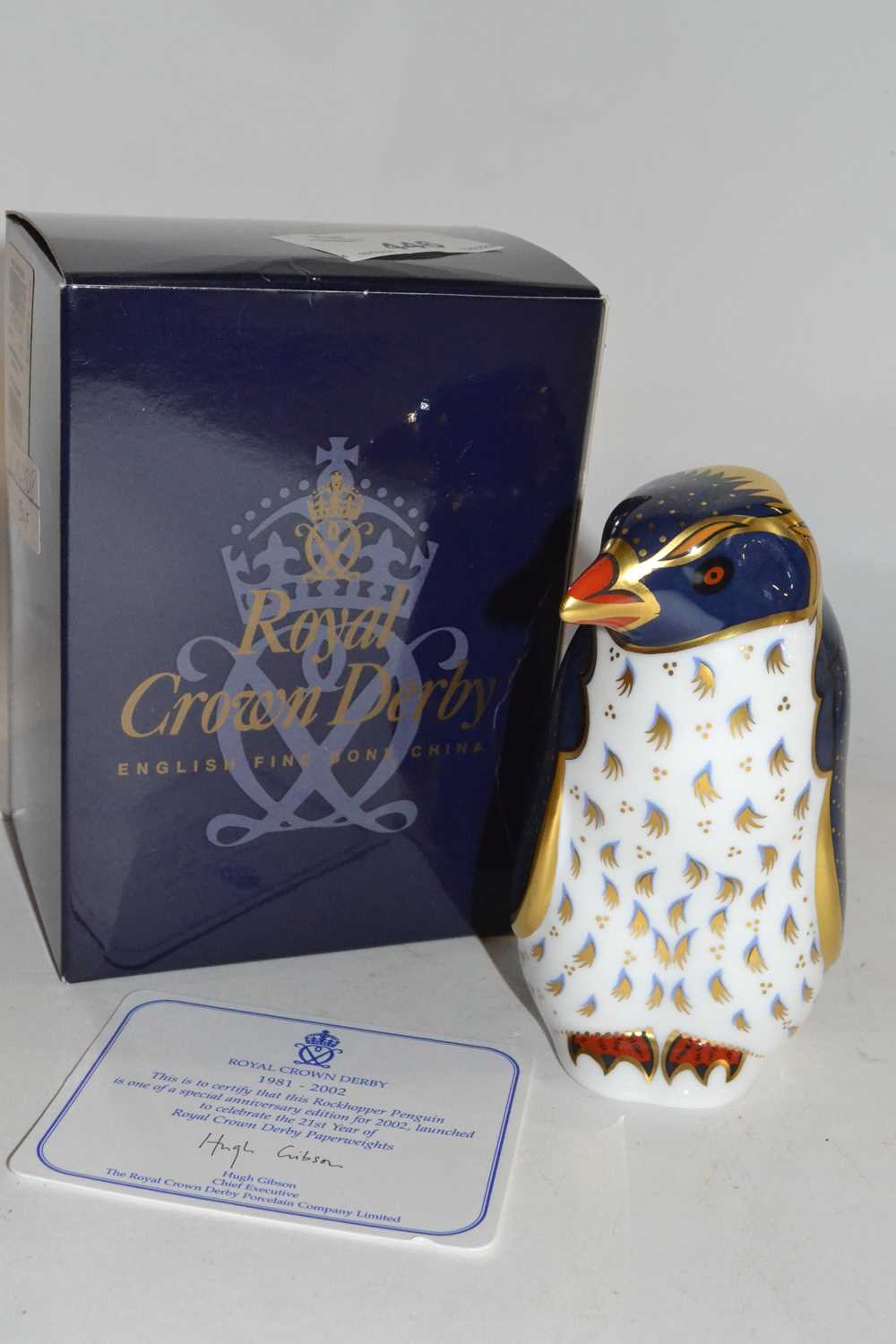 Lot 446 - Boxed Royal Crown Derby paperweight of a rock...