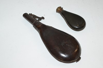 Lot 452 - Two 19th Century leather powder flasks