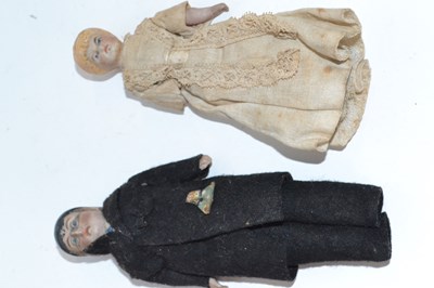 Lot 453 - Two small Victorian dolls in original costume