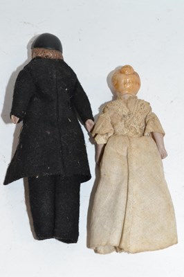 Lot 453 - Two small Victorian dolls in original costume