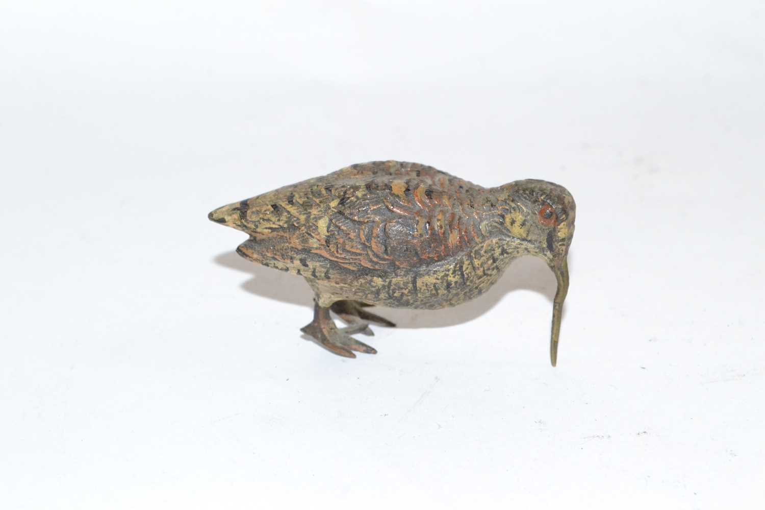 Lot 470 - A cold painted model of a wading bird with...