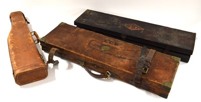 Lot 49 - Three leather gun cases to include leg of...
