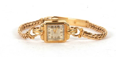 Lot 193 - An 18ct gold Movado ladies wristwatch on an...