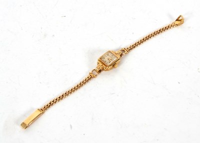 Lot 193 - An 18ct gold Movado ladies wristwatch on an...